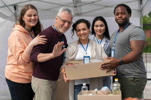 Volunteers of a nonprofit organization working together at an event. 